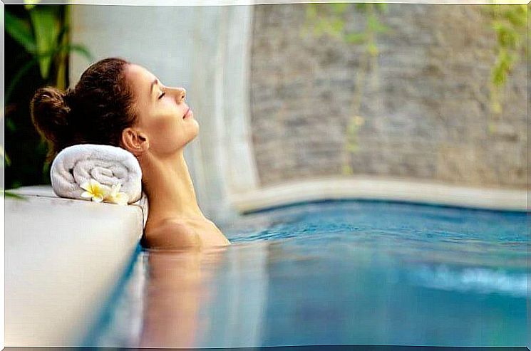 Woman in the swimming pool of a spa