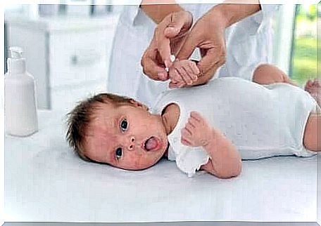 A baby on a changing table. 