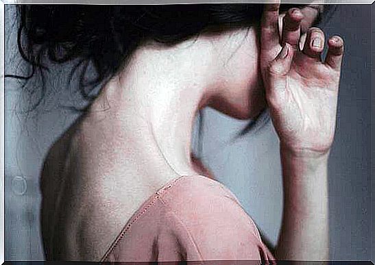 woman hiding her face