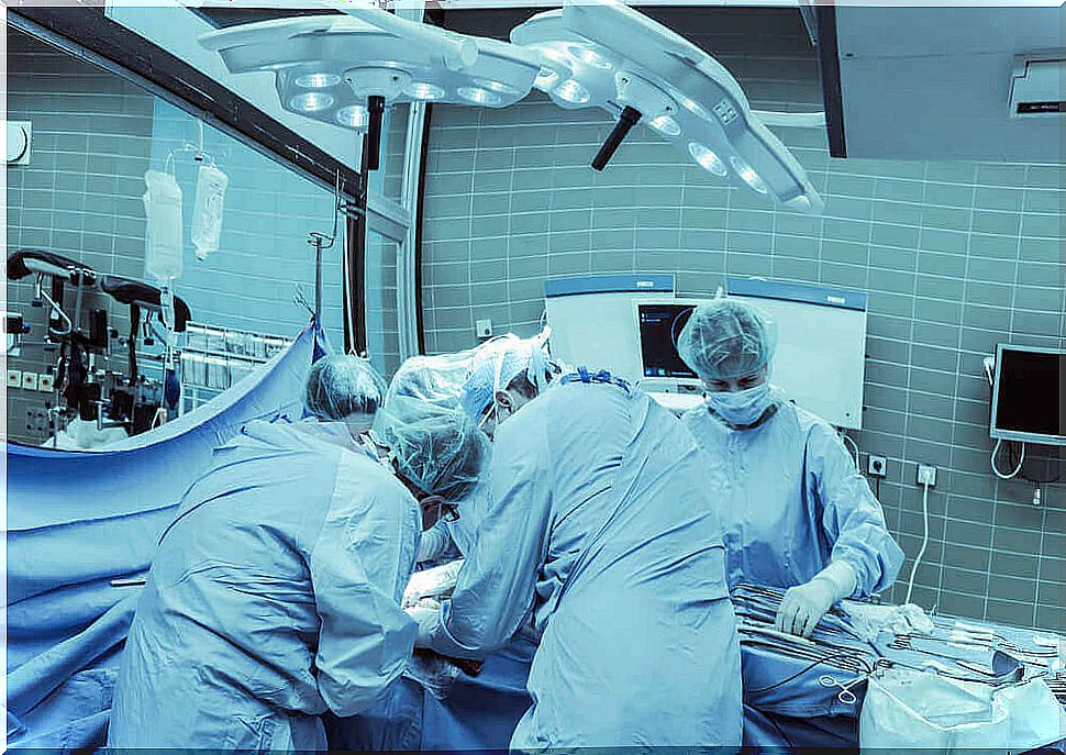 Surgeons performing a hemispherectomy